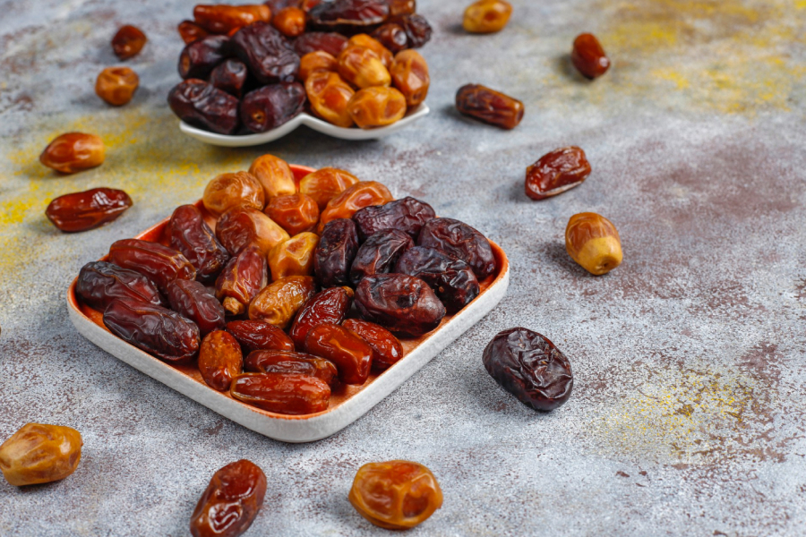 Various dates displayed on a decorative plate with rustic background